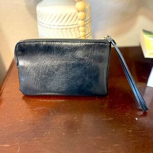 Black wristlet. Mini. Large phone can hold.